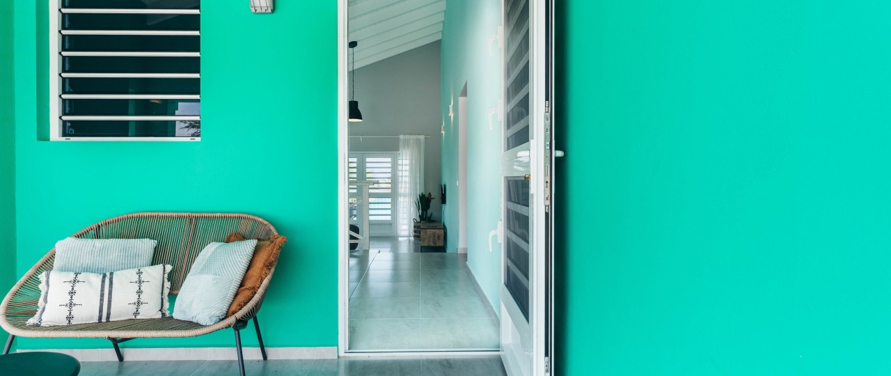 Cozy seating area at the side of the bungalow