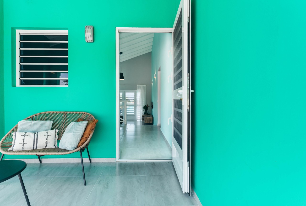 Cozy seating area at the side of the bungalow