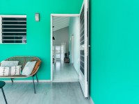 Cozy seating area at the side of the bungalow