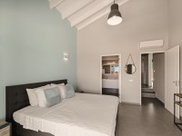 Slaapkamer deluxe bungalow.jpg